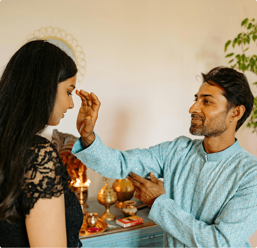 Indian couple performing traditional ritual